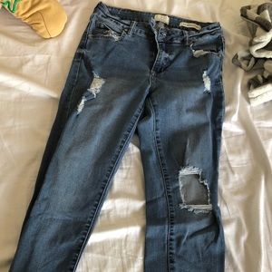 dark blue distressed jeans